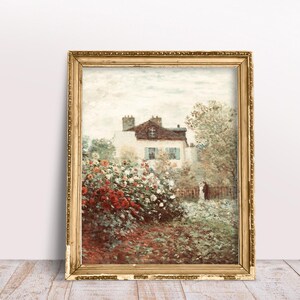 Puede incluir: Una pintura enmarcada que representa una casa con un jard&iacute;n en primer plano. La casa es blanca con un techo marr&oacute;n y tiene algunas ventanas. El jard&iacute;n est&aacute; lleno de flores coloridas y vegetaci&oacute;n. La pintura est&aacute; en un marco dorado.