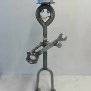 One of a Kind Metal Man Statue (playing guitar)