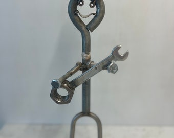 One of a Kind Metal Man Statue (playing guitar)