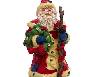 Vintage Santa Clause Christmas Figurine 5.5 In Tall Hes Holding A Wreath And A Wooden Staff
