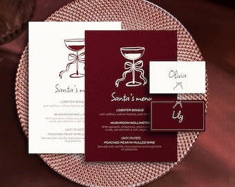 May include: Printable Christmas menu template with a red and white color scheme. The menu features a festive illustration of a wine glass with a bow and the text "Santa's menu". The menu includes two place cards with the names "Olivia" and "Lily".