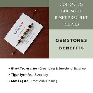 May include: A black, gold, and green beaded bracelet with a card that reads "You've Got This" and lists the gemstones and their benefits: Black Tourmaline - Grounding & Emotional Balance, Tiger Eye - Fear & Anxiety, Moss Agate - Emotional Healing.