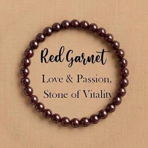 May include: A beaded bracelet made of dark red garnet stones. The text on the image reads "Red Garnet, Love & Passion, Stone of Vitality."
