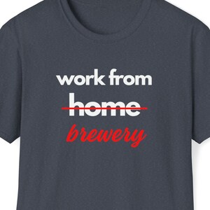 May include: A dark blue t-shirt with the text "work from home" crossed out and replaced with "brewery" in red.