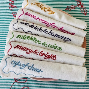 Gestickte festliche Phrase Servietten (6er Set)
