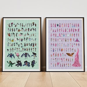 May include: Two framed art prints. The left print has a light green background with numerous cartoon figures. The right print has a lavender background with cartoon figures. Both prints are in black frames and lean against a white wall.