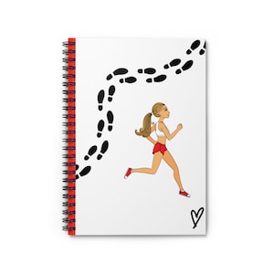 May include: A white spiral notebook featuring a black and white illustration of a woman running, leaving a trail of footprints behind her. The notebook has a red spiral binding and a red heart at the bottom.