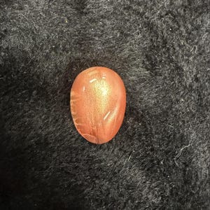 32.4 ct. Oregon Sunstone with the natural backing