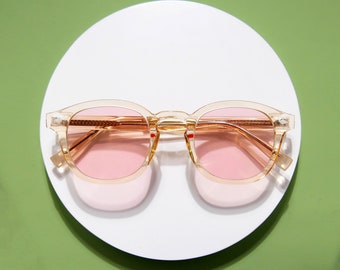 Verres teintés roses, monture champagne en cristal, style rétro