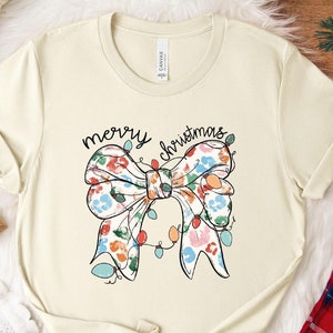 Kokette Weihnachtsbogen-T-Shirt: Festliches Feiertags-Lichter-T-Stück