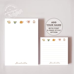 May include: White notepad and sticky note set with a decorative teacup design. The notepad and sticky note have the name "Isabella" printed at the bottom. The image also includes the text "Add Your Name With Font & Page Style Option."