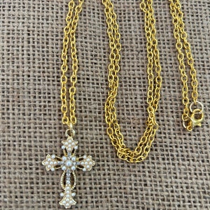 Gold color chain with cross pendant