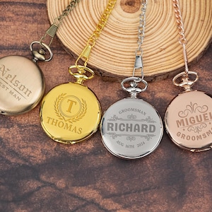 May include: Four gold and silver pocket watches with engraved names and dates. The watches have chains attached to them.