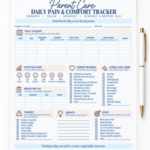 May include: A white Parent Care Daily Pain & Comfort Tracker paper form with blue text and a gold pen. The form includes sections for daily tracking, pain scale guide, medication log, comfort measures, well-being, triggers, insights, and goals.
