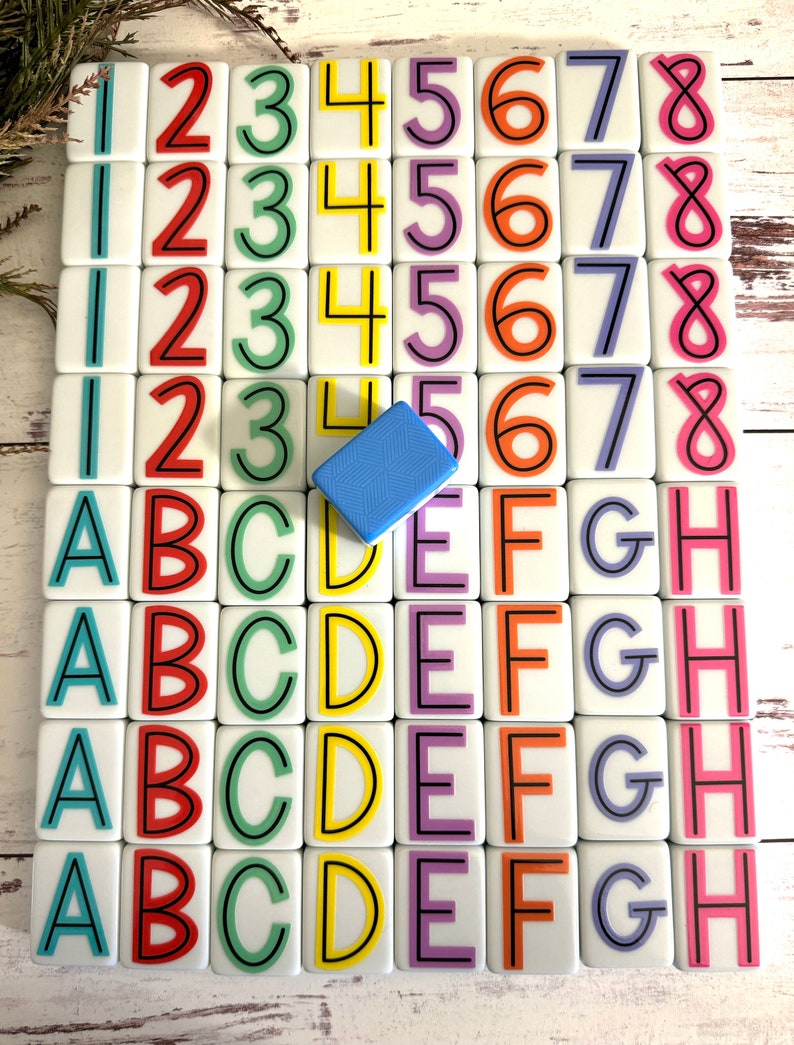 May include: A set of white tiles with colorful numbers and letters. The numbers are 1 through 8 and the letters are A through H. The tiles are arranged in a grid pattern.