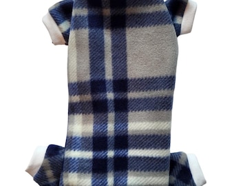 May include: A blue and white plaid fleece dog onesie with white trim around the neck, sleeves, and legs.