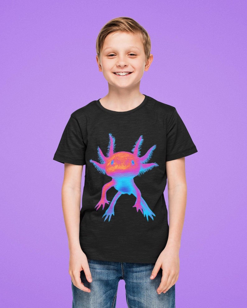May include: A black t-shirt with a colorful axolotl graphic. The axolotl is a pink, blue, and orange amphibian with feathery gills.