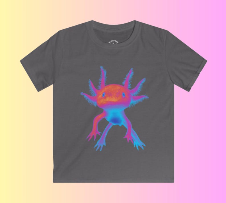 May include: A dark gray t-shirt with a colorful axolotl graphic. The axolotl is pink, blue, and purple with a white outline. The axolotl is facing forward with its mouth closed.