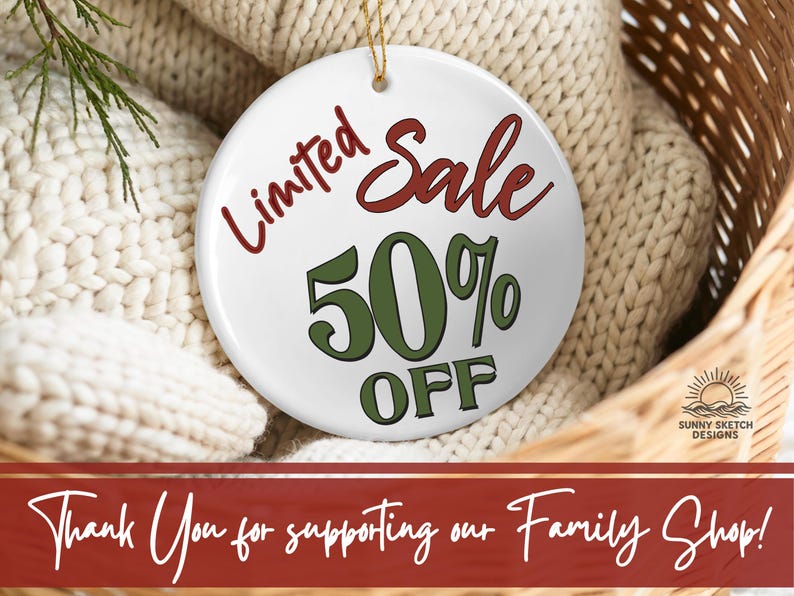 May include: A round white ceramic ornament featuring the red text Limited and the red text Sale, with the green text 50% and the green text OFF. A small logo with the text SUNNY SKETCH DESIGNS is visible. A gold string is attached to the top.