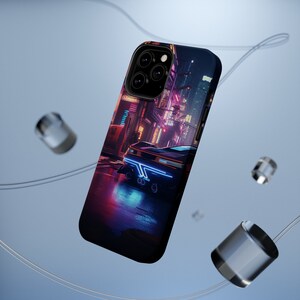 May include: A black iPhone case featuring a neon cityscape and a futuristic car design. The case has a black background with a neon blue and pink cityscape and a black car with neon blue lights.