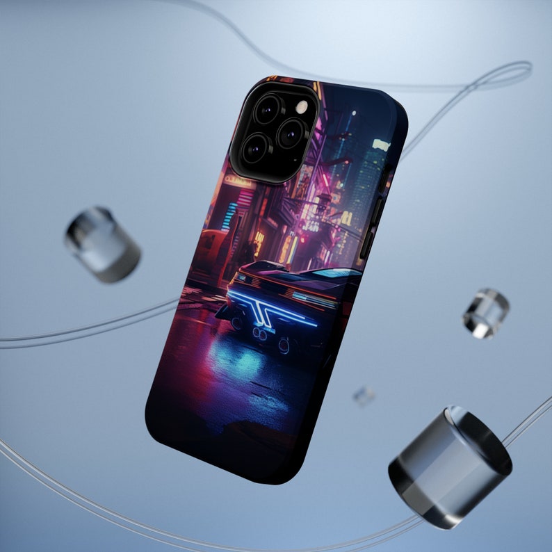 May include: A black iPhone case featuring a neon cityscape and a futuristic car design. The case has a black background with a neon blue and pink cityscape and a black car with neon blue lights.