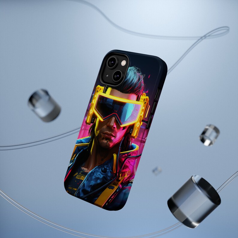 May include: A black phone case with a colorful illustration of a person wearing neon yellow goggles and a black leather jacket. The background is a dark blue and pink gradient.