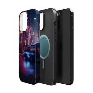May include: A black phone case featuring a neon cityscape and a futuristic car design. The case has a black and blue circular design on the back.