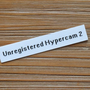 May include: A white label with the text "Unregistered Hypercam 2" printed in black.