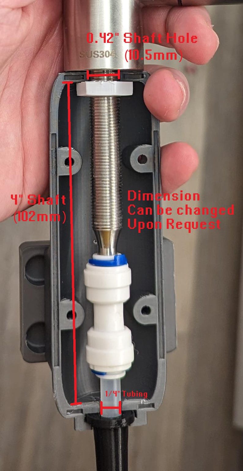 May include: A close-up of a gray metal housing with a 4-inch shaft and a 1/4-inch tubing connection. The shaft is made of stainless steel and has a 0.42-inch hole. The housing is labeled "SUS304 (10.5mm)" and "Dimension Can be changed Upon Request".
