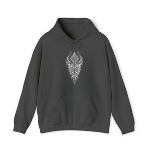 May include: A charcoal grey hooded sweatshirt with a white, intricate, tribal-style design on the front.