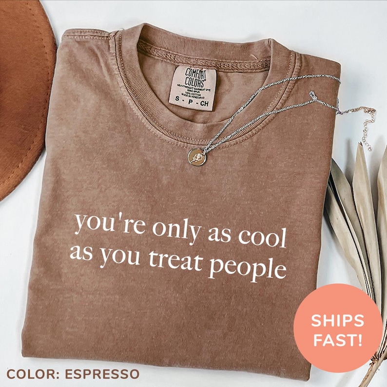 a t - shirt that says you're only as cool as you treat people