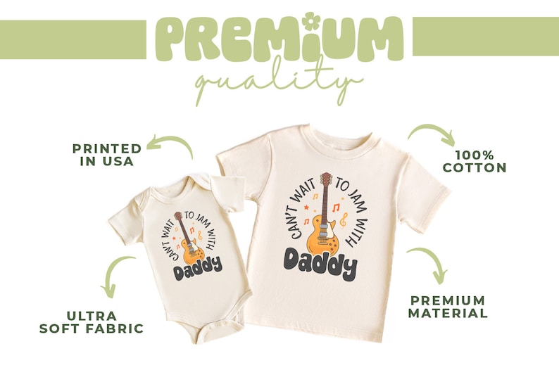 a baby's bodysuit with a guitar on it
