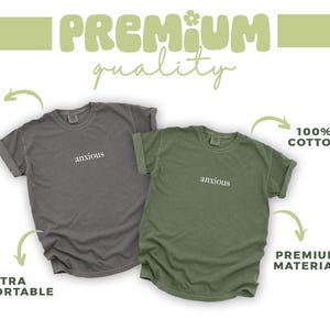 two t - shirts with the words premium quality printed on them