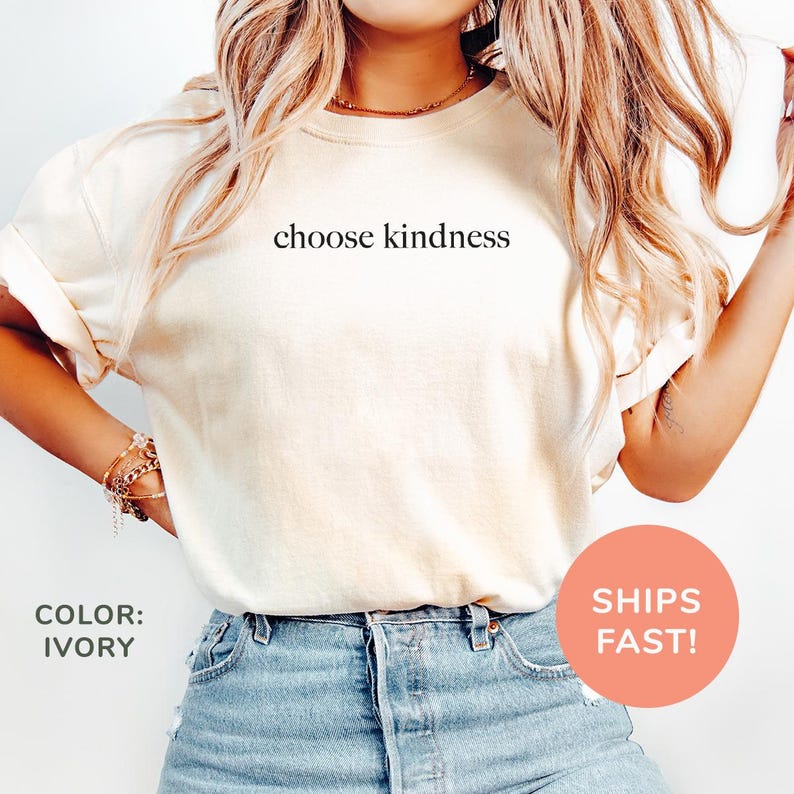 a woman wearing a t - shirt that says choose kindness