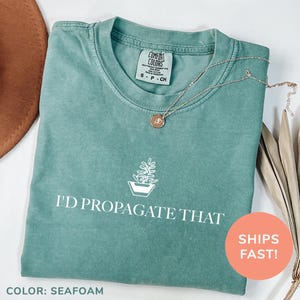 a t - shirt that says i'd propagate that on it