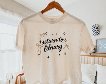 Return To Library Shirt, Coquette Bow Bookish Graphic Tee, Curte Librarian Tee, Book Lover Gift For Reader, Bookworm Shirt, Boxy Crop Top