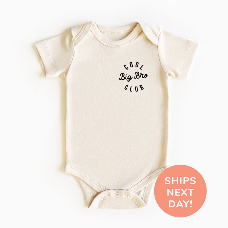 a white bodysuit with the words dog love club on it