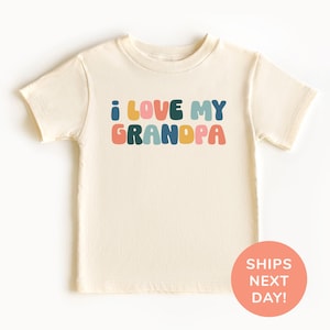 a white shirt with the words i love my grandpa printed on it