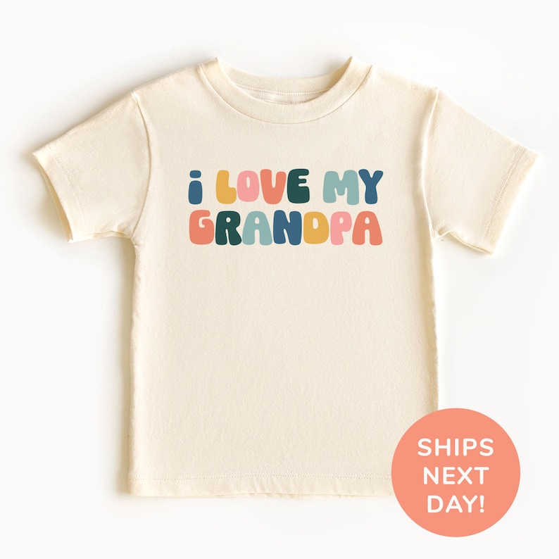 a white shirt with the words i love my grandpa printed on it