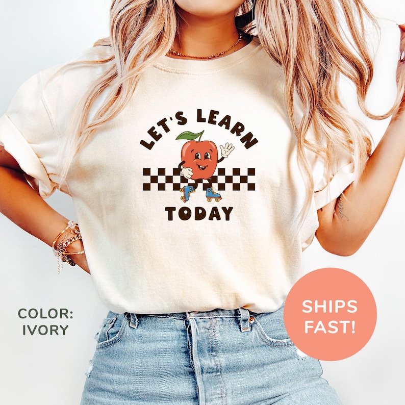 a woman wearing a t - shirt that says let's learn today