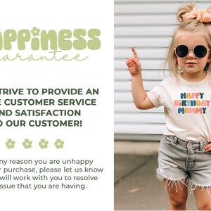 a little girl wearing sunglasses and a happy birthday t - shirt