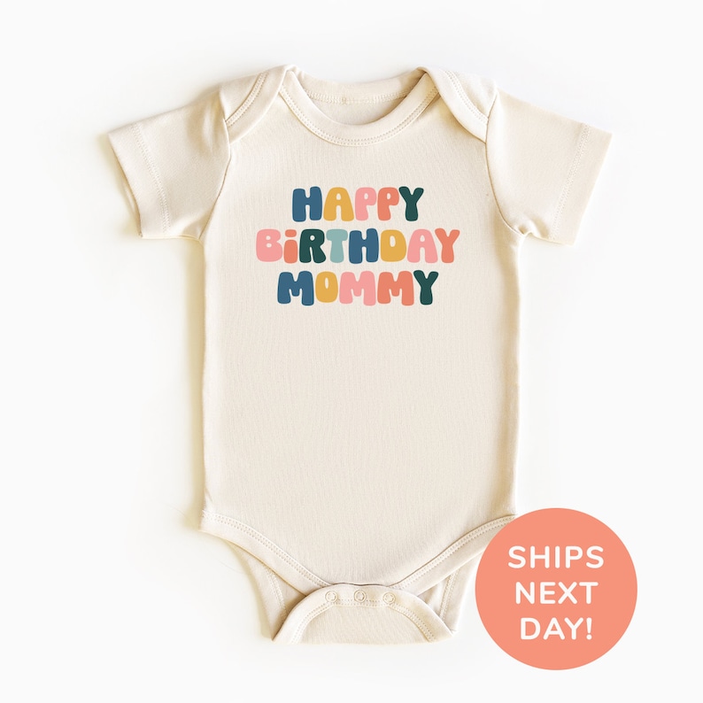 a baby bodysuit with the words happy birthday mommy printed on it