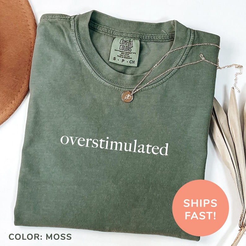 a green shirt with the words oversimulated on it