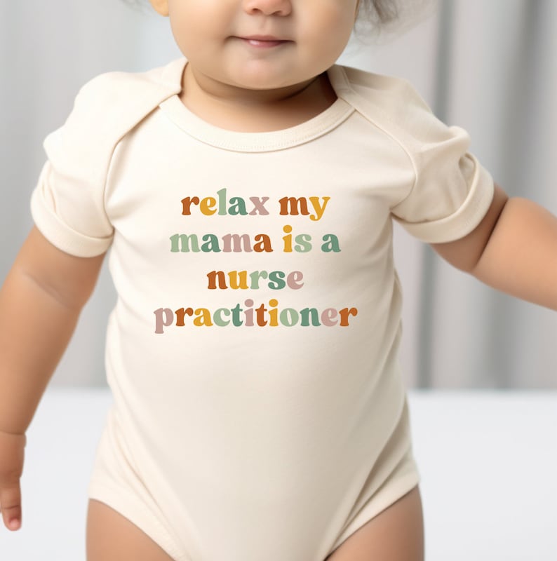 a baby wearing a bodysuit that says relax my mama is a nurse