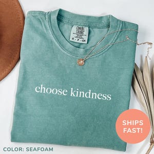 a t - shirt that says choose kindness on it