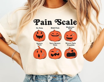 Spooky Pumpkin Nurse Shirt: Halloween Pain Scale RN T-Shirt