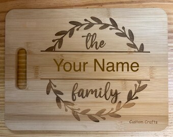 Tabla de cortar con el nombre de la familia