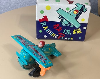 Vintage Tin Training Plane Wind up Toy