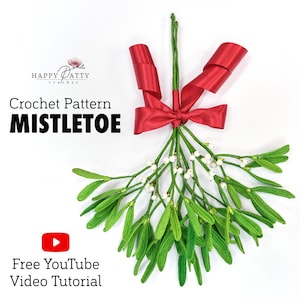 May include: A crocheted mistletoe pattern with green leaves and white berries, tied with a red satin bow. The image includes the text "Crochet Pattern MISTLETOE" and a YouTube tutorial link.