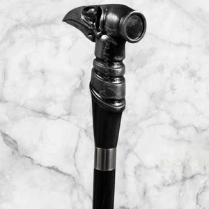 - Raven Head Walking Stick  
- Black Walking Cane  
- Gothic Walking Cane  
- Steampunk Walking Stick  
- Handmade Wooden Cane  
- Victorian Walking Stick  
- Collectible Walking Cane  
- Unique Walking Stick  
- Carved Wooden Cane  
- Antique Style Cane  
- Raven Handle Cane  
- Luxury Walking Stick  
- Personalized Walking Cane  
- Fantasy Walking Stick  
- Elegant Wooden Cane  
- Stylish Walking Stick  
- Mythical Bird Cane  
- Walking Stick for Men  
- Cosplay Walking Cane